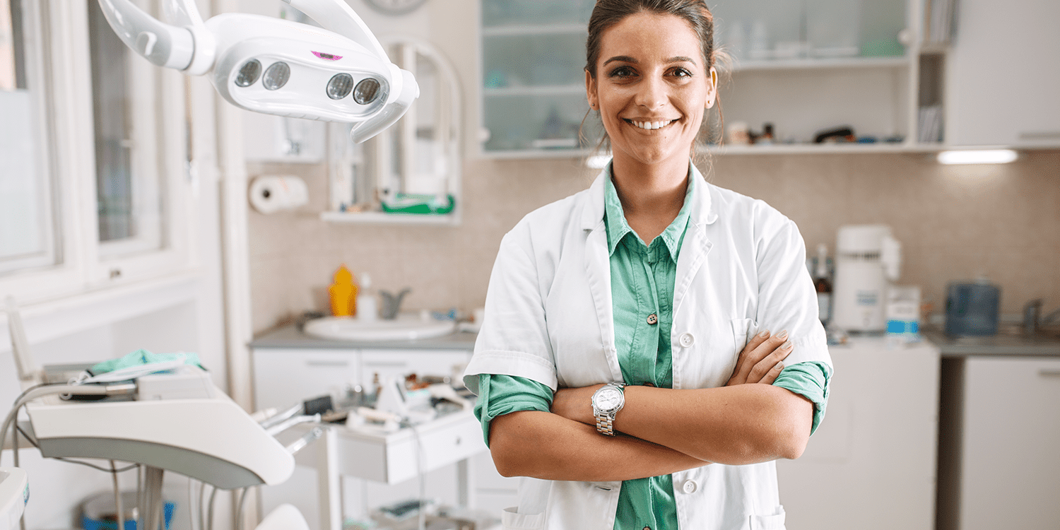 doctor smiling in front of camera