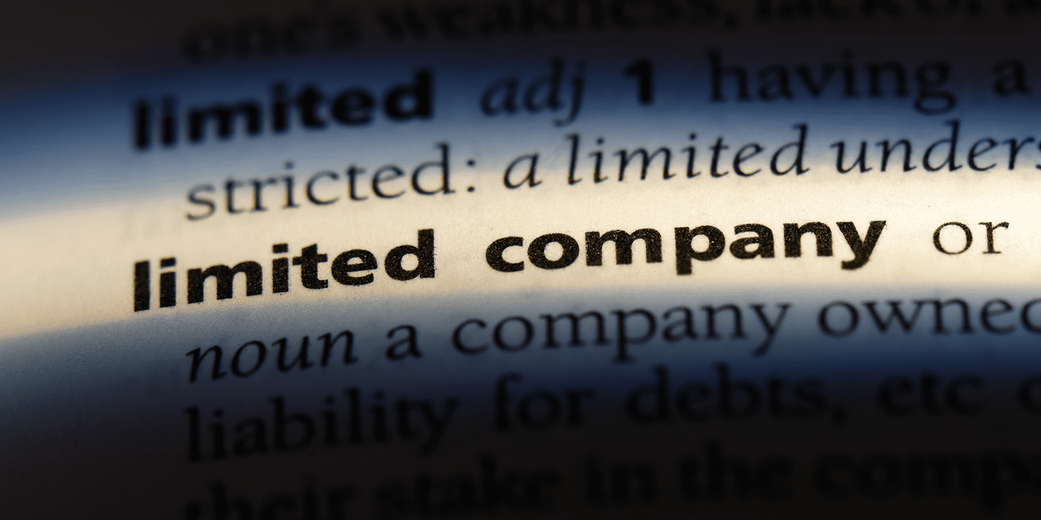 Close-up image of an excerpt from a dictionary entry that provides the definition of a limited company