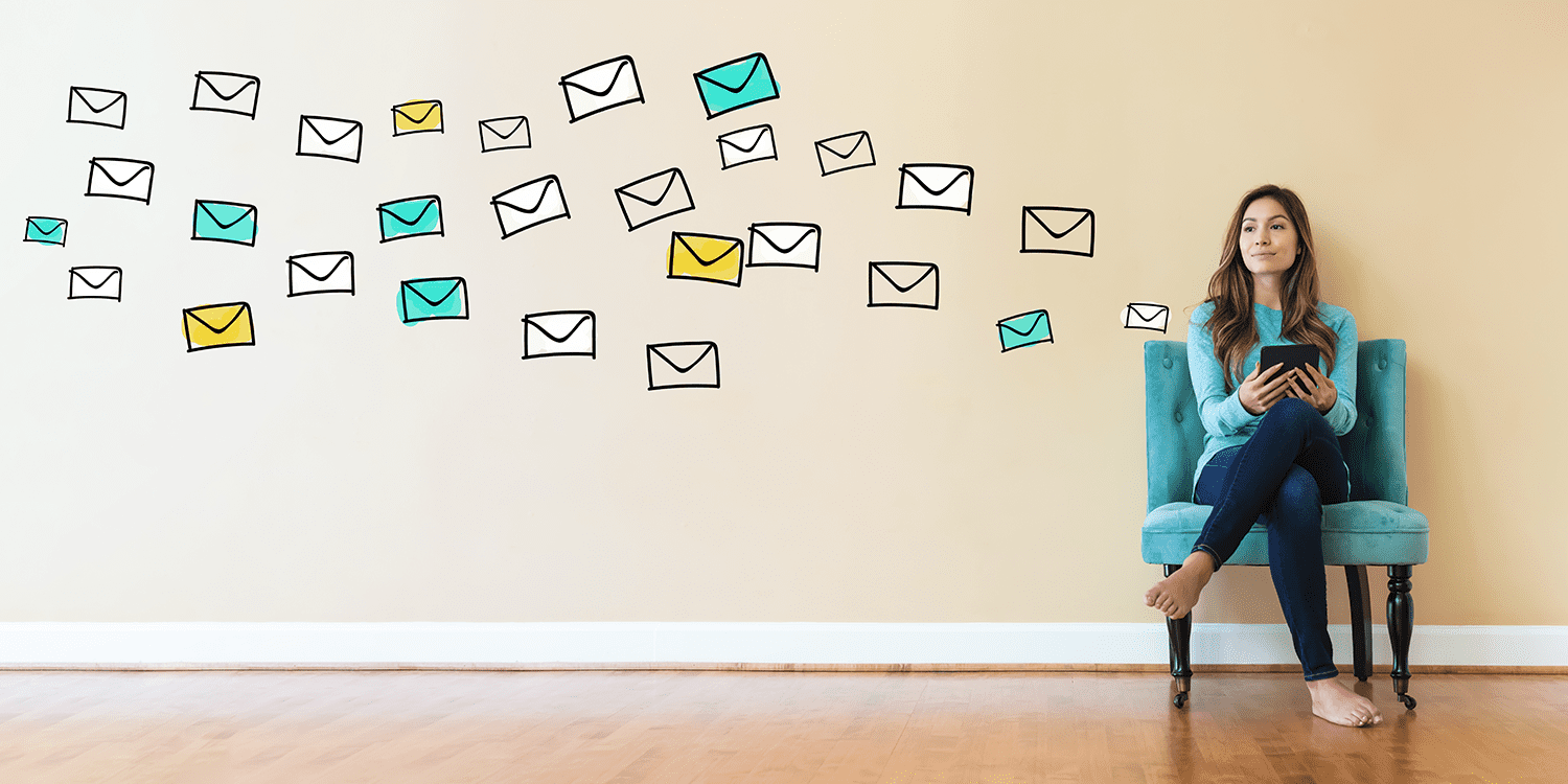 mail flying next to sitting woman