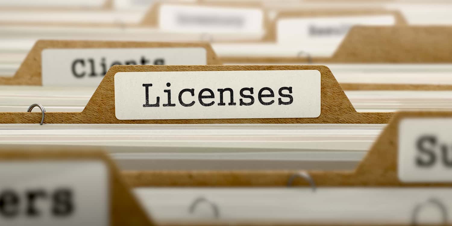 The word 'Licences' on folder register of card index illustrating the business licence concept.
