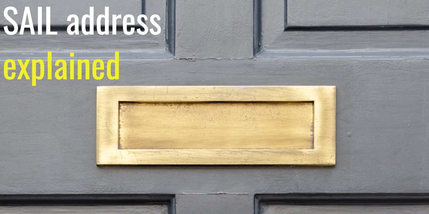 Grey wood panelled door with brass letterbix and headline 'SAIL address explained'.