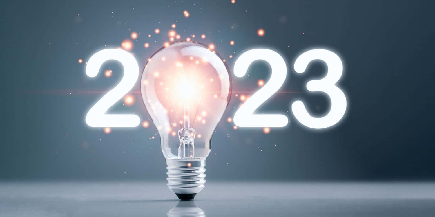 2023 lightbulb with glowing light sparkling effect. Concept of best busienss ideas for 2023.