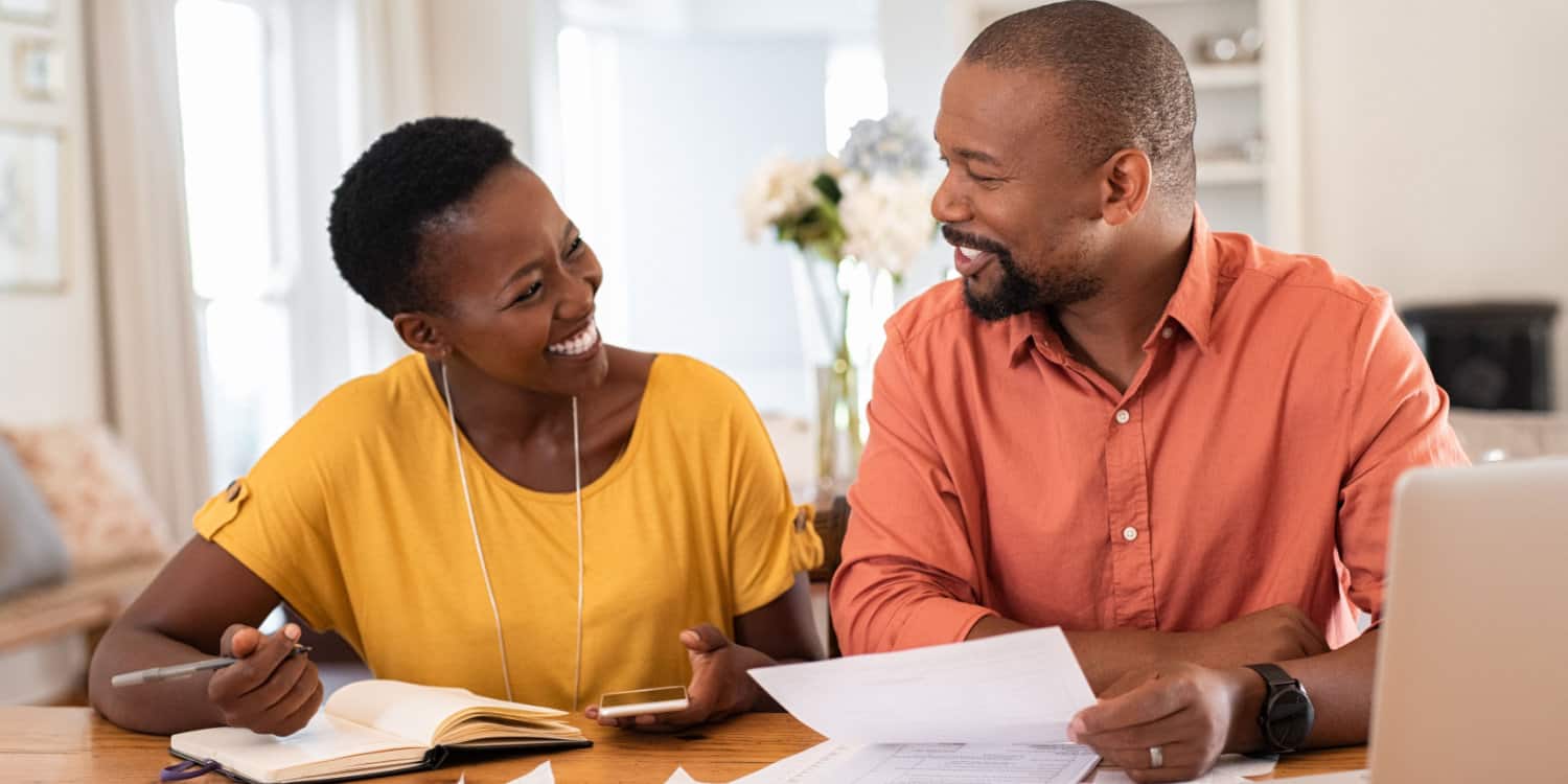 Two company owners working out their working from home expenses.