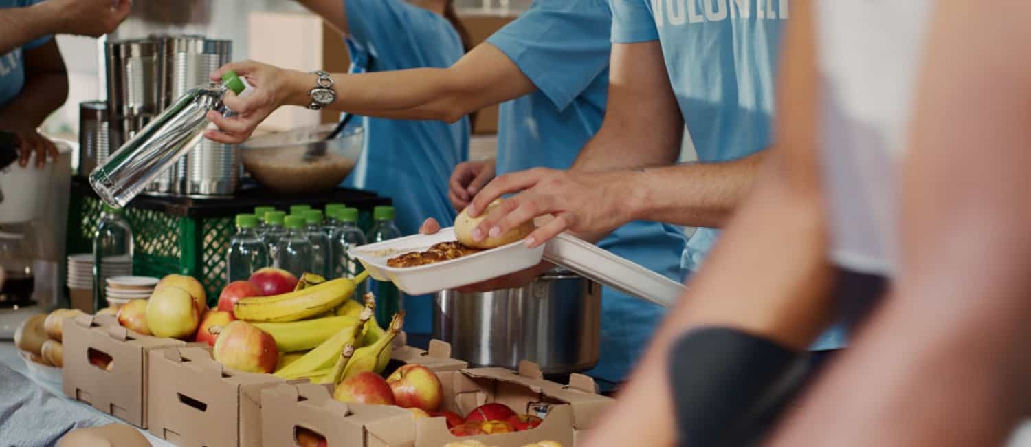 Volunteers at a local food bank helping to reduce food waste
