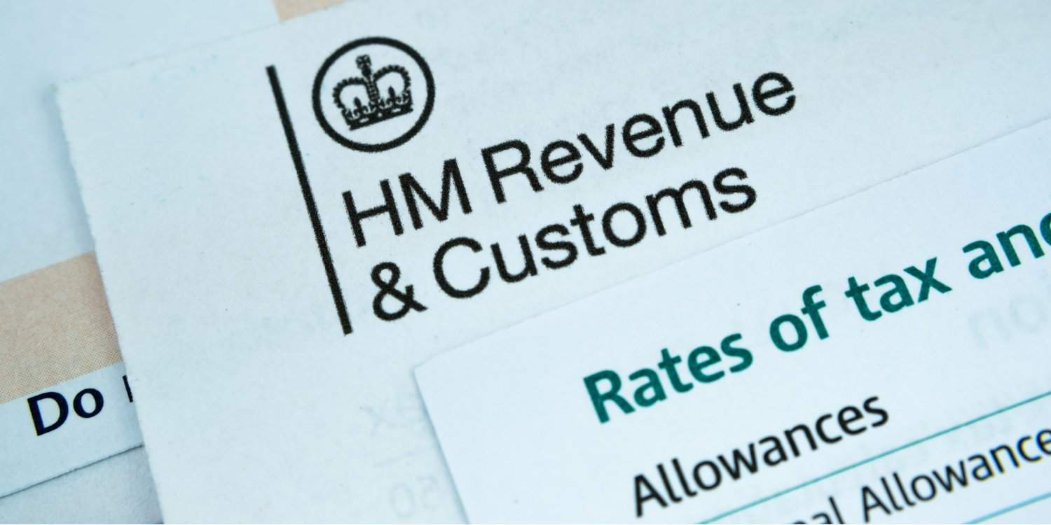 Close-up of HM Revenue & Customs document displaying Employment Allowance tax rates and allowances, with official logo prominently featured.