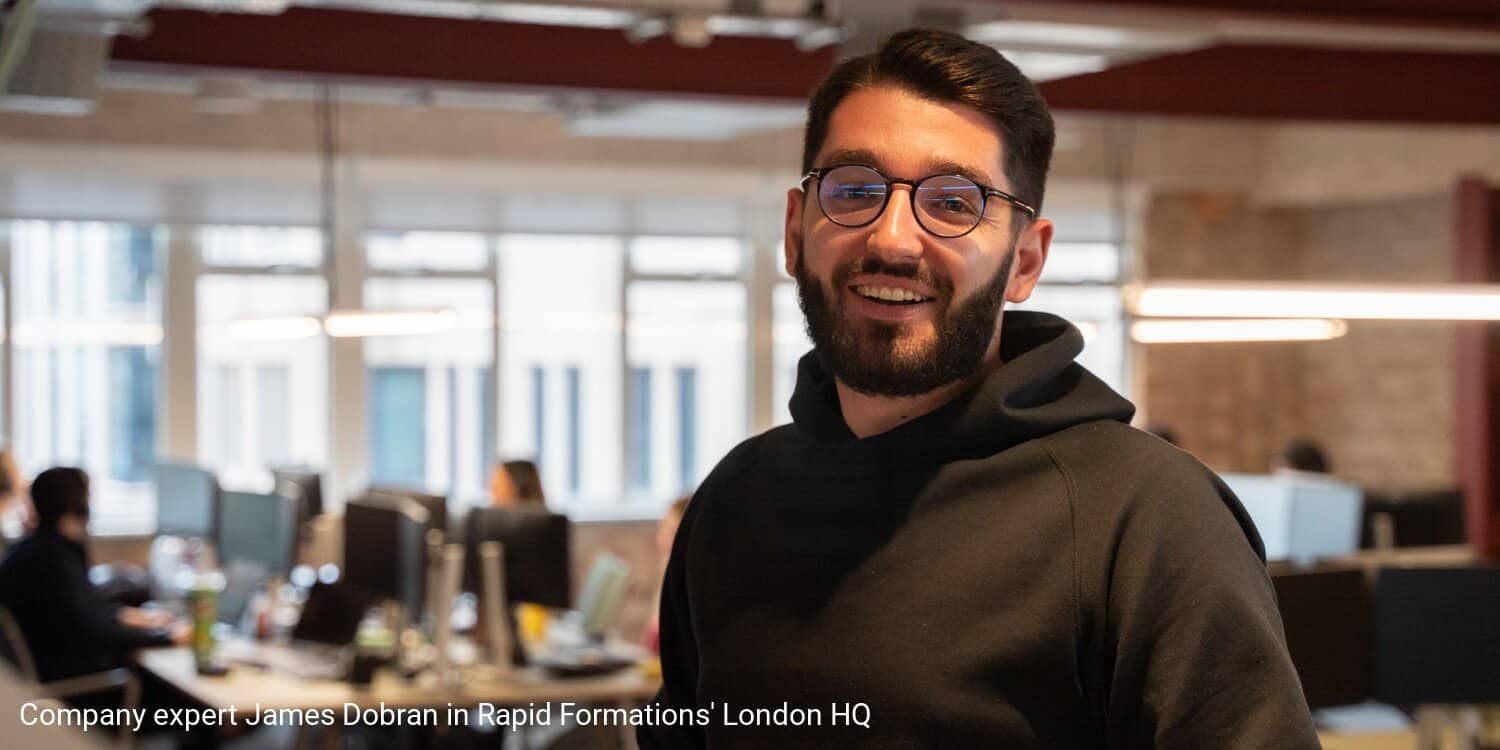 A portrait of company expert James Dobran, standing in Rapid Formations' offices in Covent Garden, London.