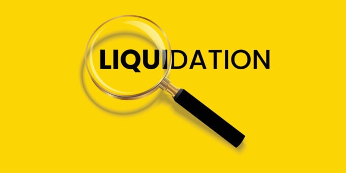 Illustration of a magnifying glass focusing on the word "Liquidation" against a yellow background, representing business closure and asset liquidation.